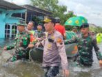 Kompol Rismanto Memimpin Evakuasi Banjir di Semarang dan Mengantarkan Jenazah Nenek Romlah ke Pemakaman